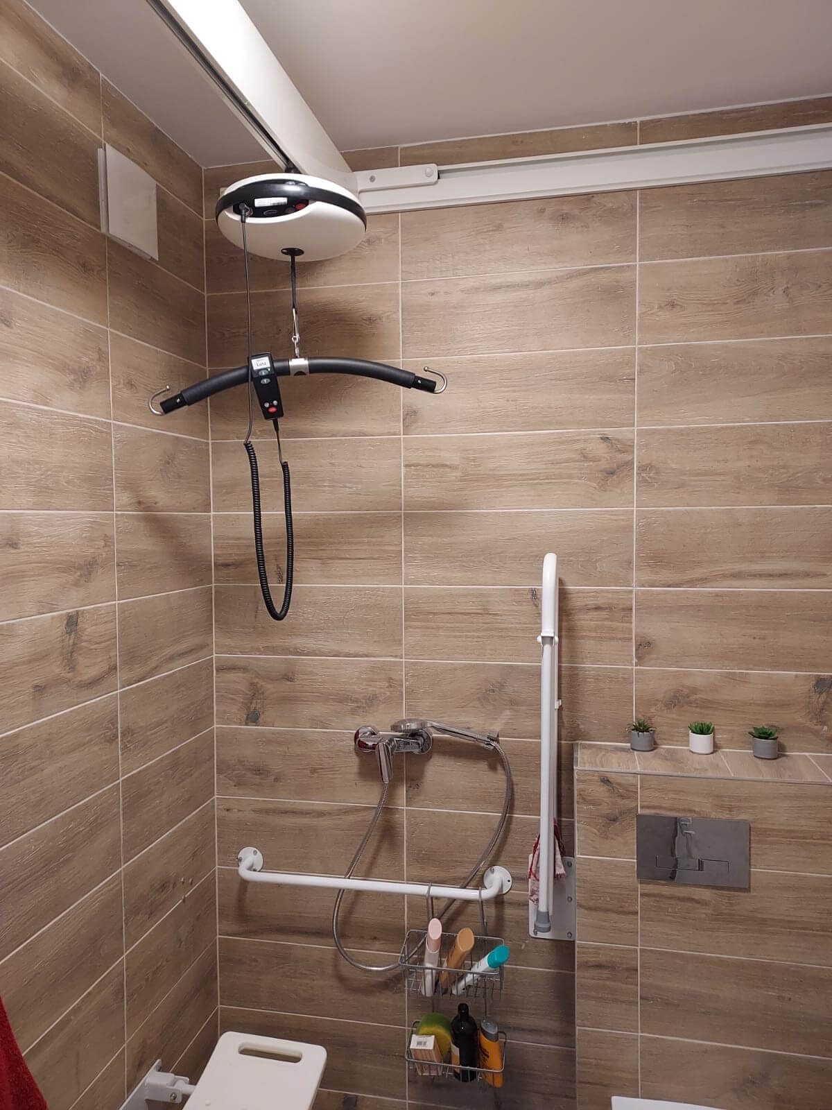 podnośnik sufitowy dla osób niepełnosprawnych